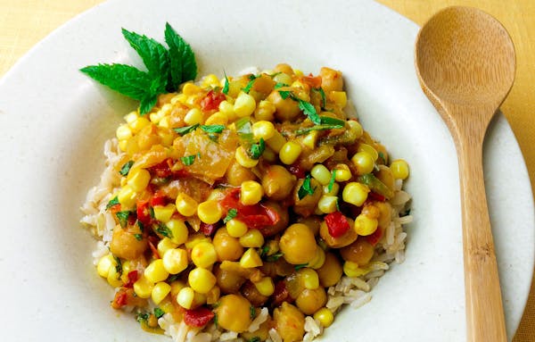 Robin Asbell, Special to the Star Tribune Sweet Corn Masala Over Brown Rice