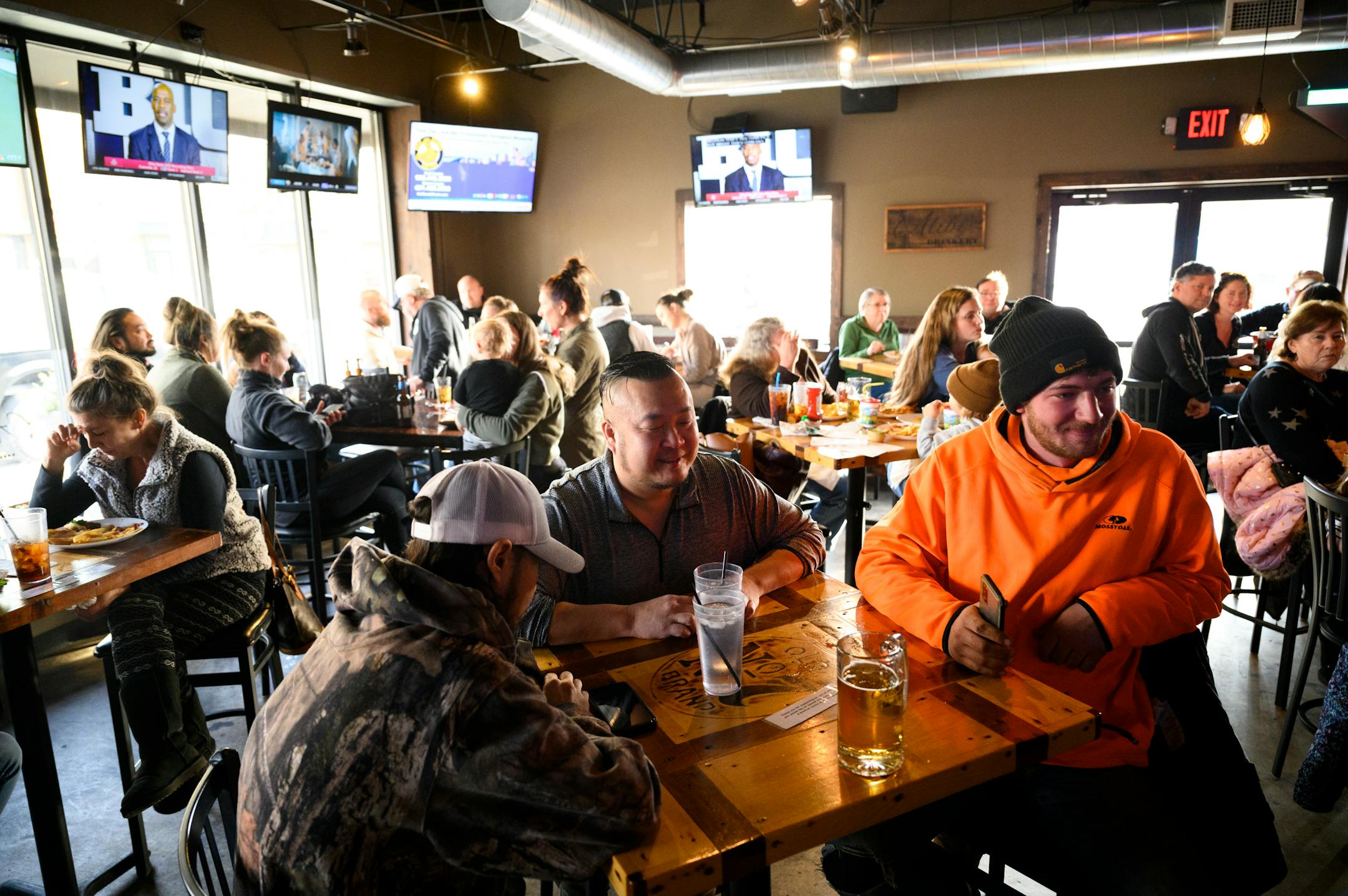 Patrons, most of them unmasked, packed every table at Alibi Drinkery in Lakeville Wednesday.