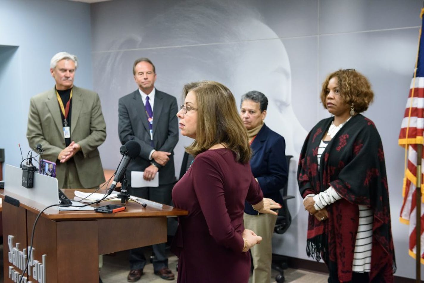 St. Paul Public Schools Superintendent Valeria Silva. Behind her L to R, high school principals Doug Revsbeck of Harding, Mike McCollor of Washington Tech, Mary Mackbee of Central, Theresa Neal of Como.