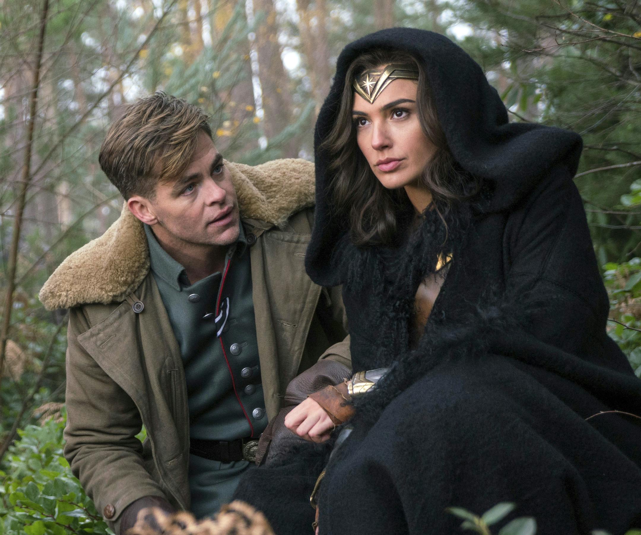This image released by Warner Bros. Pictures shows Chris Pine, left, and Gal Gadot in a scene from, "Wonder Woman." (Clay Enos/Warner Bros. Pictures via AP)