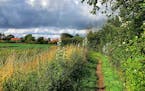 A trip to Walsberswick, England, leads to simple pleasures, such as a walk on a dirt path. By James Lileks, Star Tribune