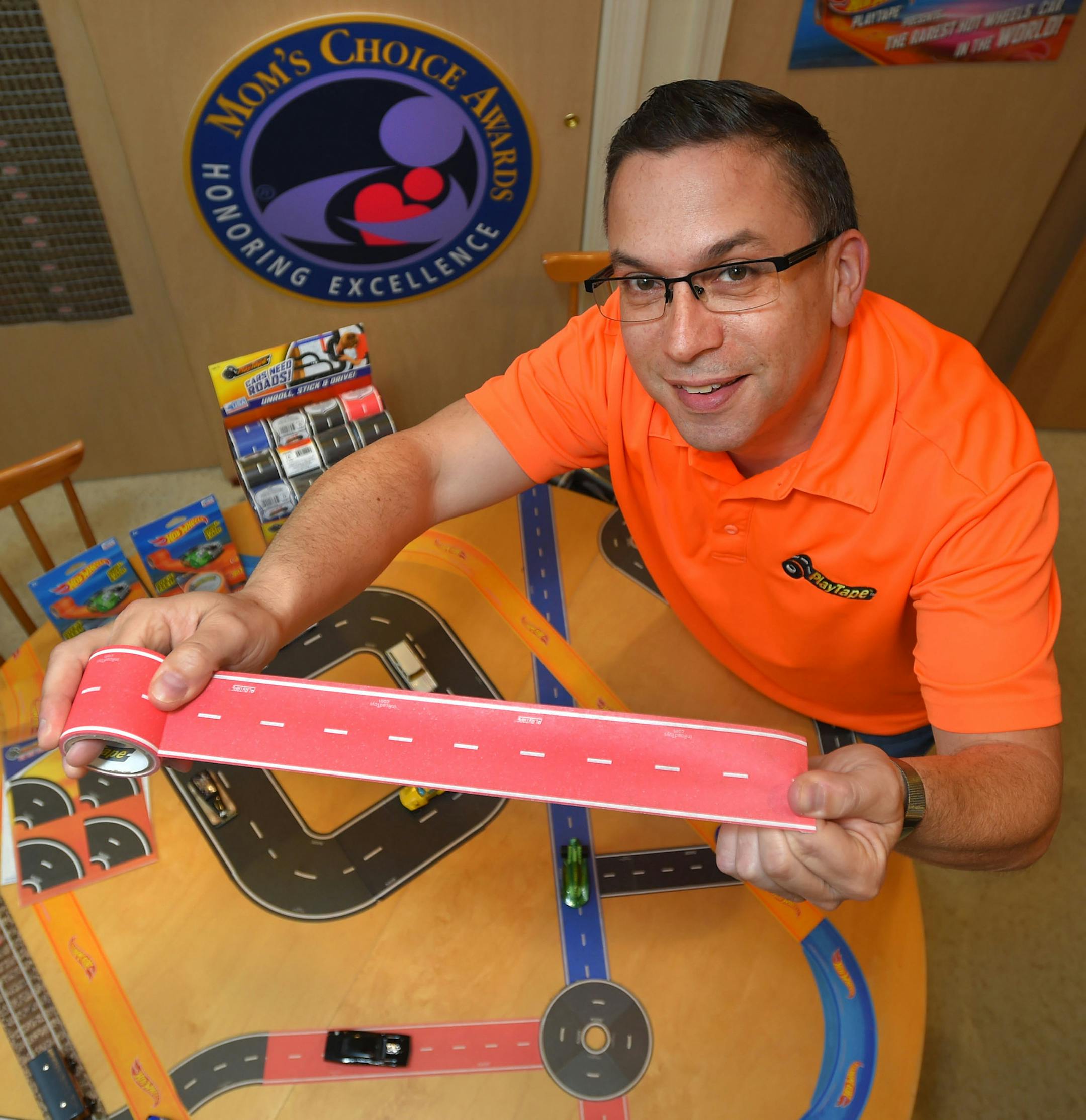 Crofton-based InRoad Toys founder/CEO Andy Musliner came up with a new category of toy out of a roll of tape. Musliner invented PlayTape, paper tape resembling roads or rails that kids can stick on flat surfaces to create roadways for toy cars. The product was launched just three hyears ago and is now available in about 12,000 stores, including Wal-Mart, Imaginarium, Target and others. (Lloyd Fox/Baltimore Sun/TNS) ORG XMIT: 1202014
