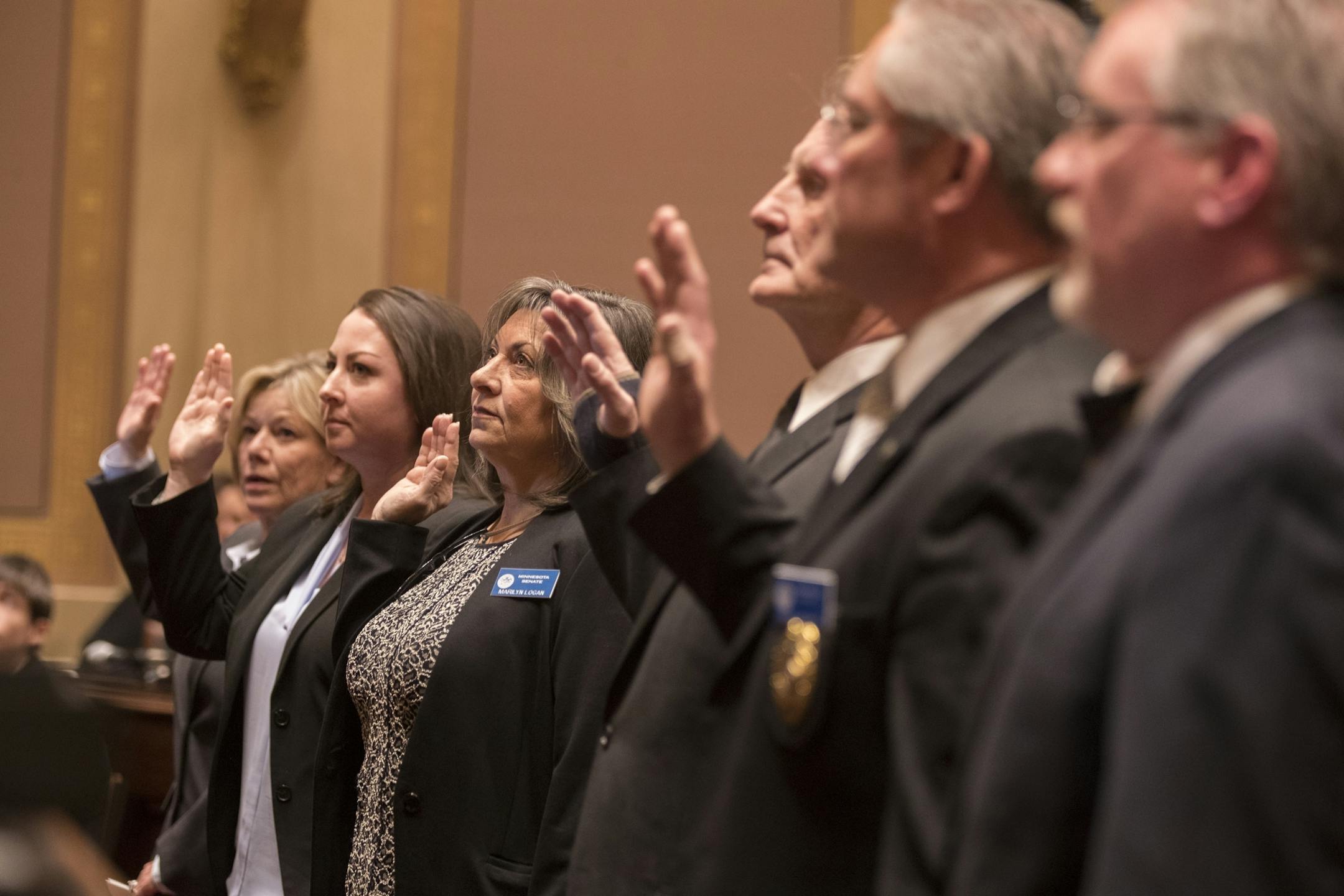 Senate officers are sworn in during the session in the Minnesota Senate chambers.
