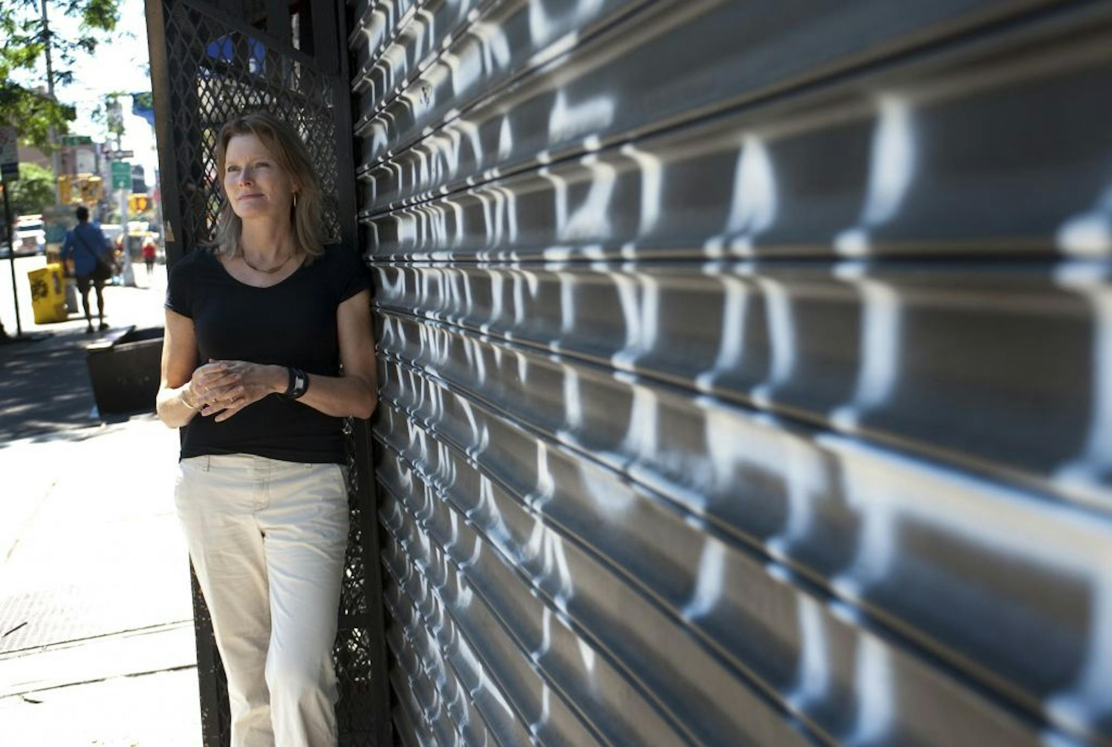 Jennifer Egan near the door of a rock club in Manhattan's East Village, scene of some events in her novel.