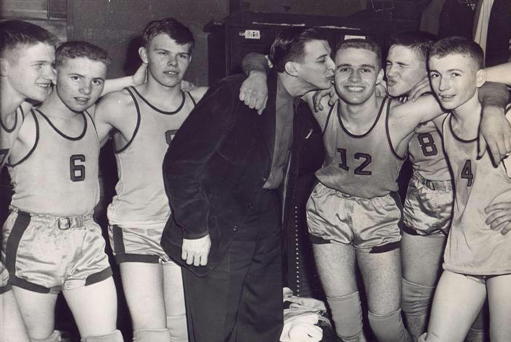 Beth Gilleland, Minneapolis
Beth's father, Wayne "Lefty" Gilleland, who early in his career coached a high school team in Wanamingo, Minn. The year was 1952. Austin beat Wanamingo in the region finals. Dad is kissing the star player, Roger Hostager, who went on to play for four years at St. Olaf.