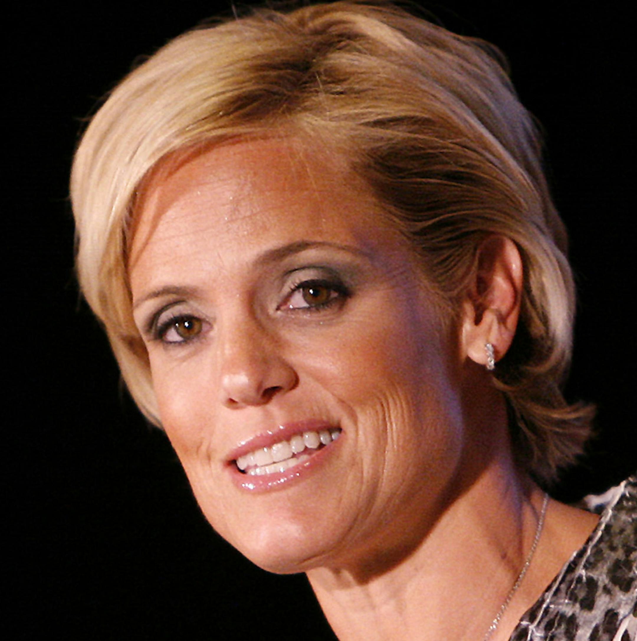 ** FILE ** This is a Feb. 3, 2009 file photo showing Olympic swimmer Dara Torres speaking after being honored during the Thurman Munson Awards Dinner in New York. Torres is ready to get back in the pool. All patched up after Beijing, the 41-year-old swimming mom is preparing for her first meet since winning three silver medals at the the Olympics, with an eye toward competing at this summer's world championships in Rome. (AP Photo/Jason DeCrow, File) ORG XMIT: MIN2013091817585615