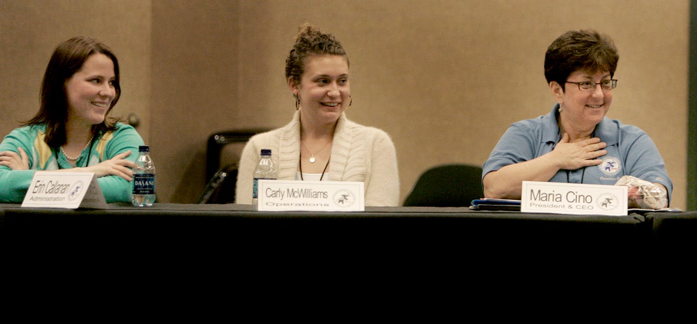 RNC interns Erin Callanan, left, and Carly McWilliams sat in awe of Maria Cino during a thank-you lunch at the Xcel Center last week. As fundraising has faltered, Cino has relied on interns and volunteers for more help with staging the convention. She started her activism as a high school student.