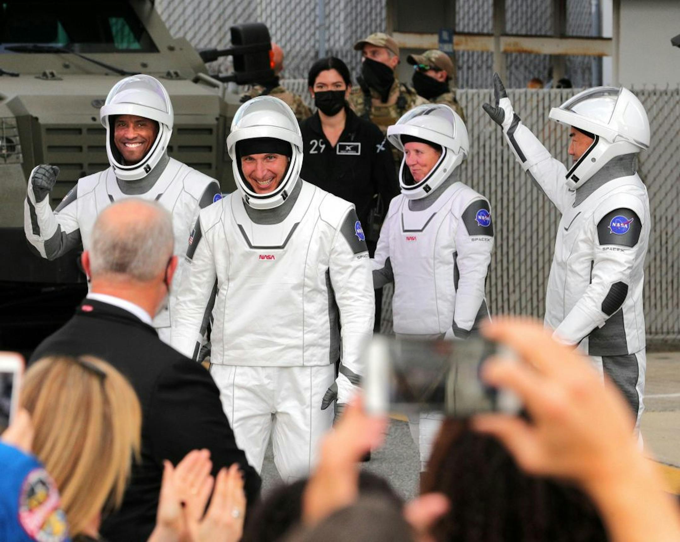 The astronauts of SpaceX Crew-1 head for complex 39-A for launch of the Falcon 9 rocket to the International Space Station, Sunday, Nov. 15, 2020, at Kennedy Space Center, Florida. From left, pilot Victor Glover, spacecraft commander Michael Hopkins, mission specialist Shannon Walker, and mission specialist Soichi Noguchi.