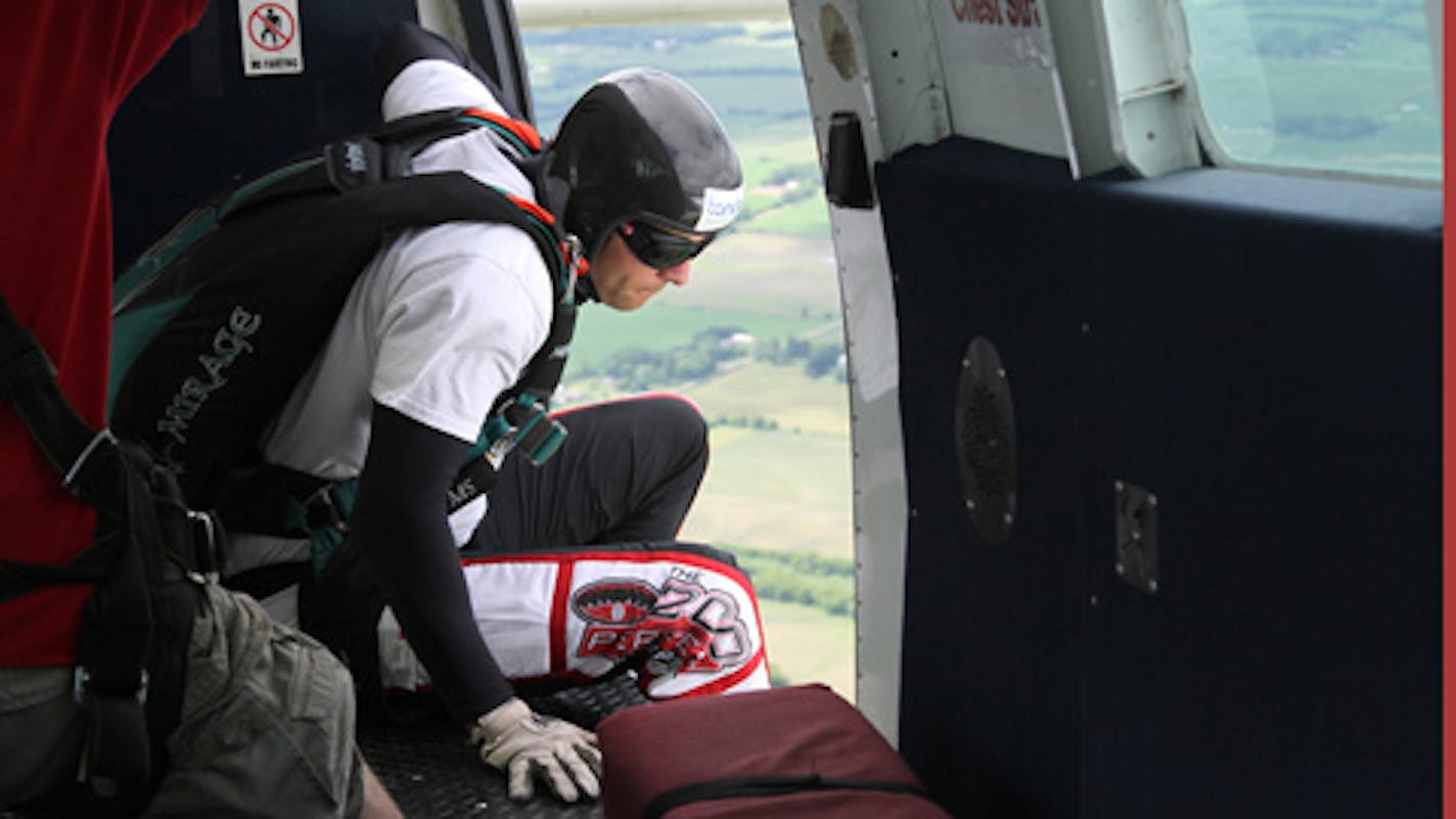 Kevin Burkart prepared to skydive toward his goal of completing 200 jumps in 24 hours. Burkart started the event, 200 Perfect Jumps, to raise money for Parkinson's disease after his father was diagnosed in 1999. He completed 100 jumps in 2008 and raised his goal to 200 jumps this year.