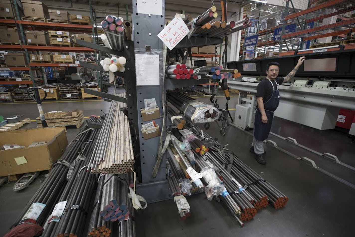 Bounyasith khounnala (cq) a machinists at Graco, worked with bar stocks, long bars ofsteel, that will turned into smaller parts and tools Monday March 12, 2018 in Minneapolis, MN.