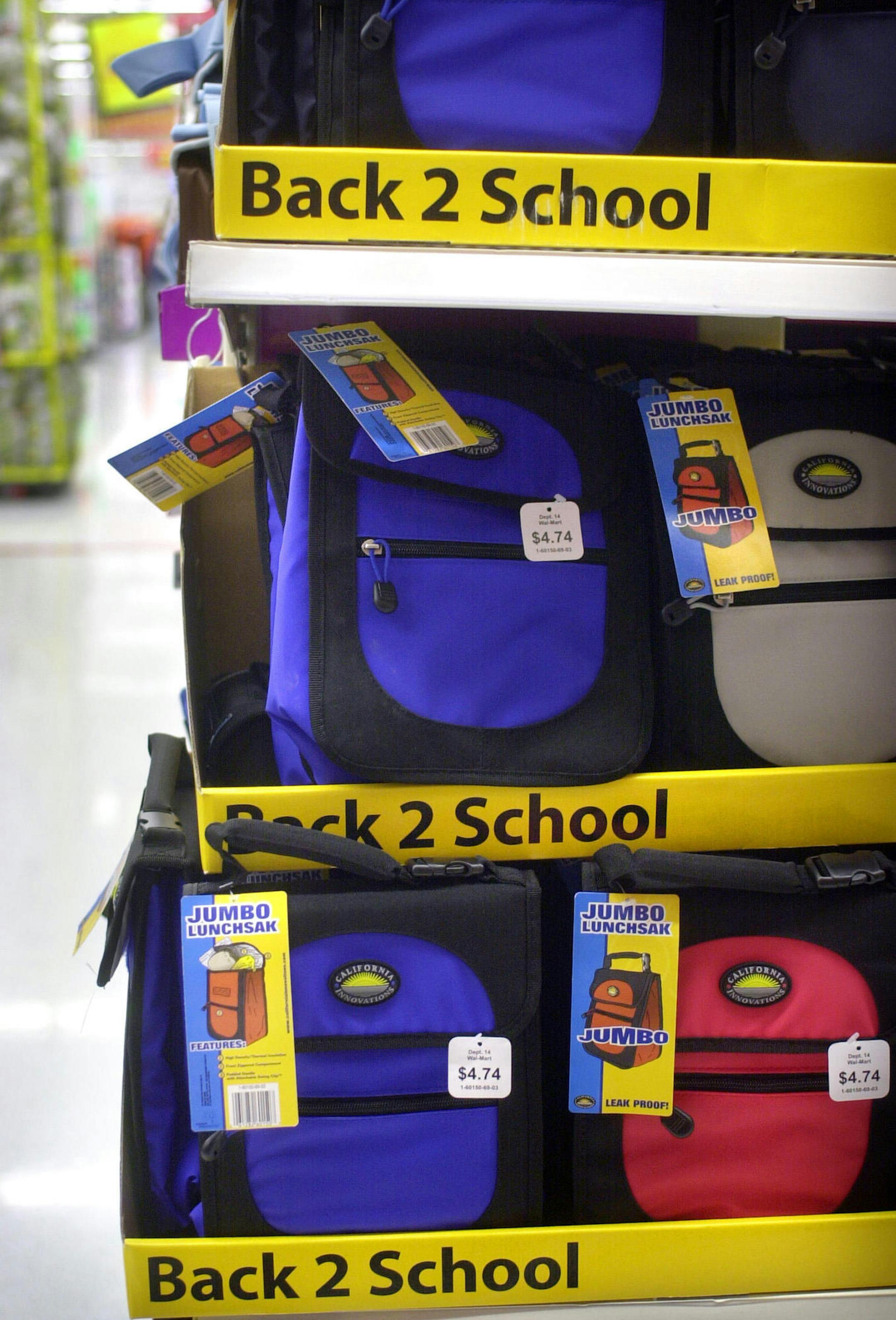 Apple Valley, MN, September 4, 2003 -- Consumers may have had fuller wallets last month, but they still favored value-priced retailers for their back-to-school shopping. Discounters like Wal-Mart were among the national chains Thursday to report sales at stores open at least a year beat expectations in August. . Items like Levi Strauss jeans are also on Wal-Mart shelves. This is the Back to school section of the Apple Valley, Minn. Wal-mart ORG XMIT: MIN2013071119133940