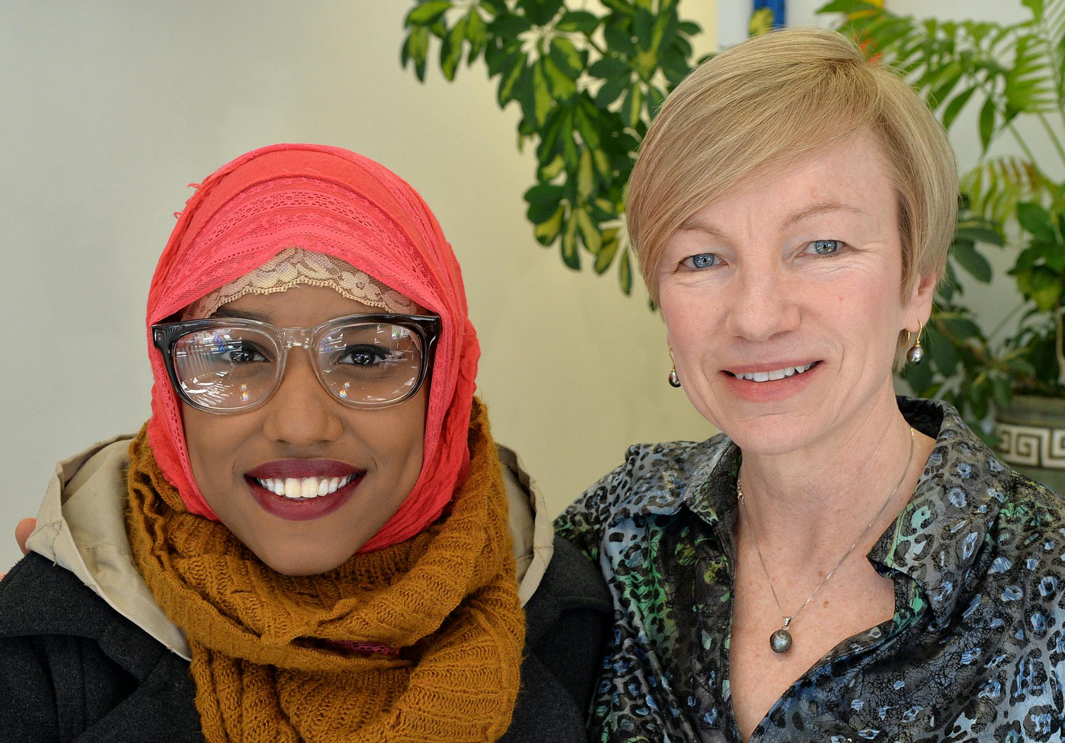 From left, featured student artist Ubah Ahmed and Howling for Wolves President and founder, Maureen Hackett. ] (SPECIAL TO THE STAR TRIBUNE/BRE McGEE) **Ubah Ahmed (left, featured student artist), Maurent Hackett (right, Howling for Wolves President and founder)