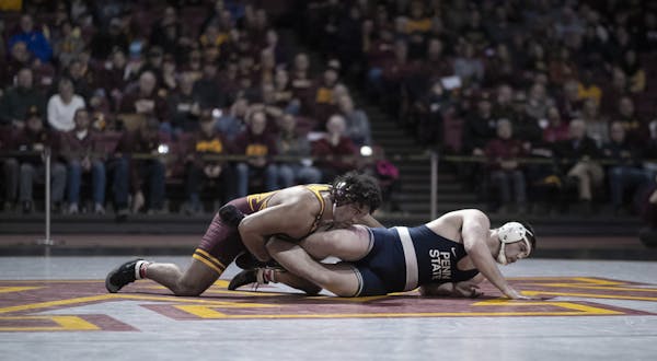 Gable Steveson scored two points on Penn States' Seth Nevills on a take down.] Jerry Holt &#x2022;Jerry.Holt@startribune.com Gophers wrestling dual me