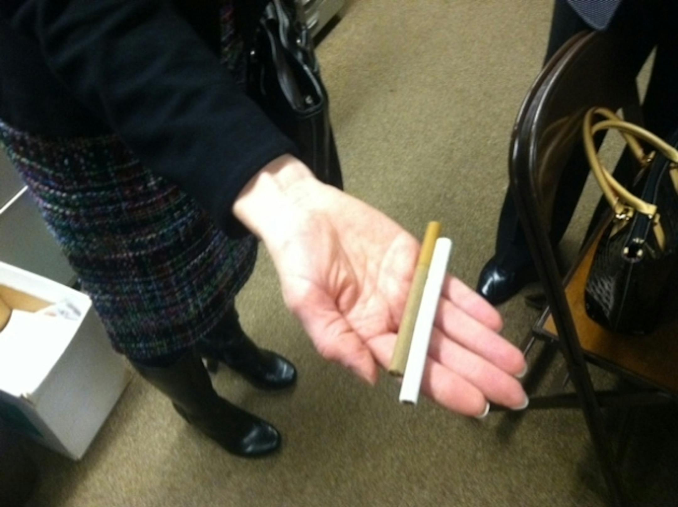 Brown product is "little cigar" compared to regular cigarette