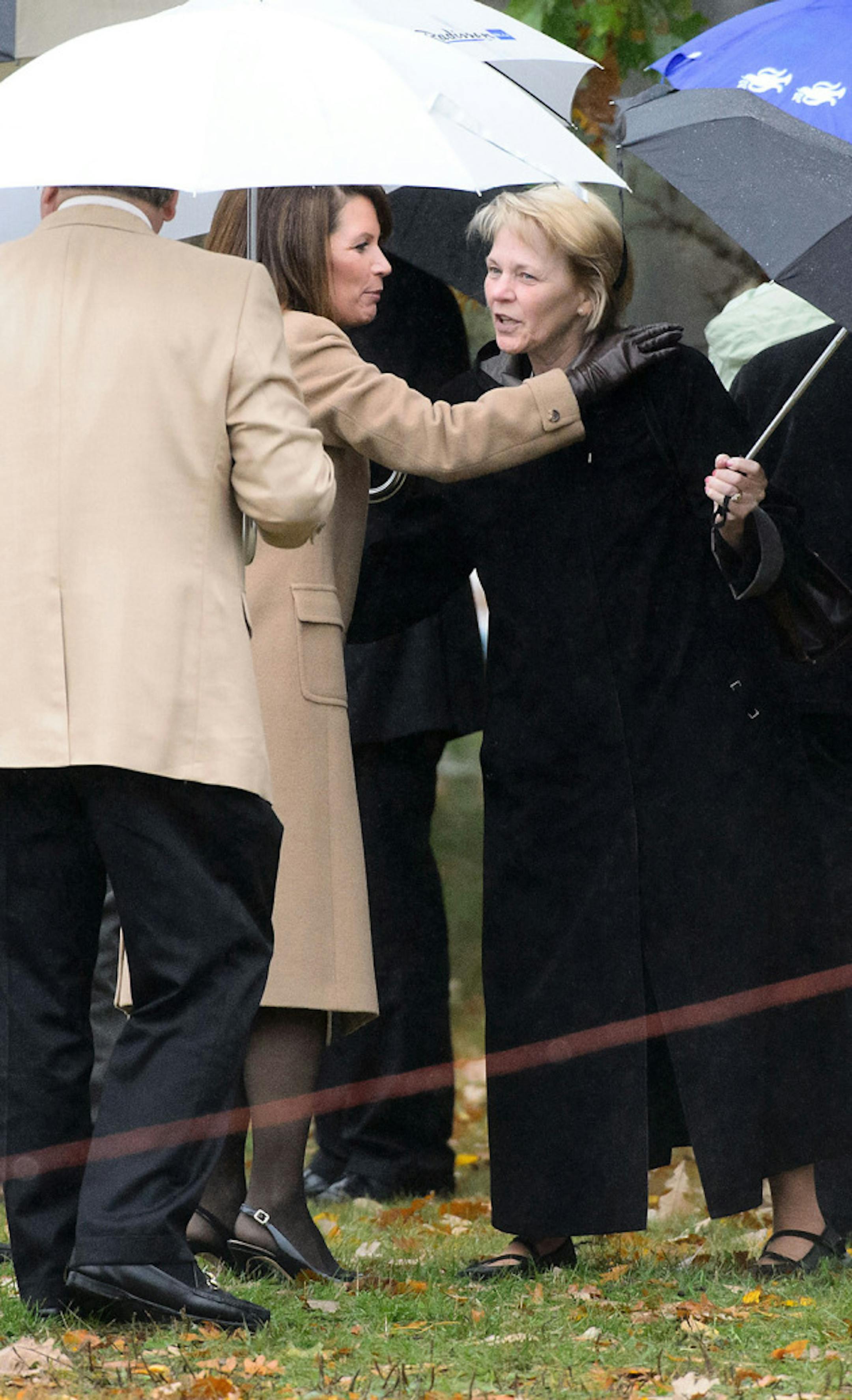 U.S. Rep. Michele Bachmann greeted State Senator Mary Kiffmeyer after Senator Grams funeral.  Sen. Rod Grams funeral service, Tuesday, October 15, 2013   A large tent was erected next to the Zion Lutheran Church in St. Francis to handle the large crowd.      ]   GLEN STUBBE * gstubbe@startribune.com