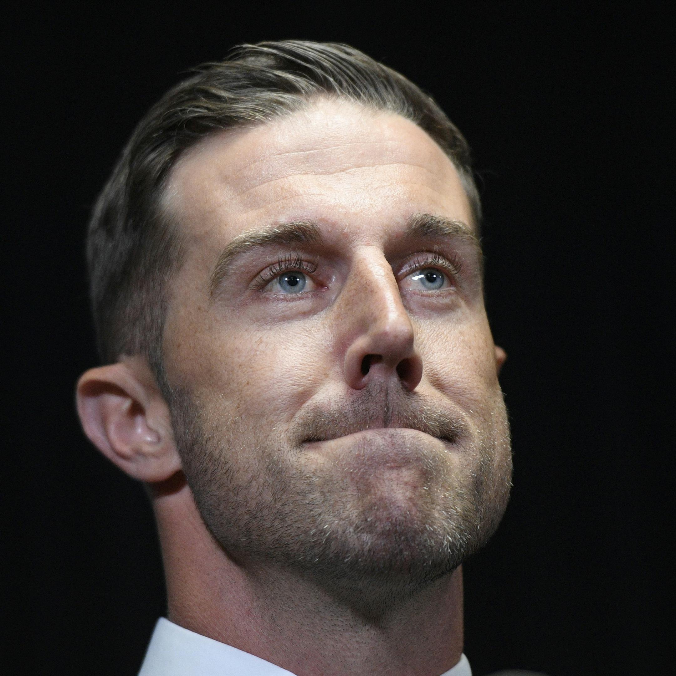 Newly signed Washington Redskins quarterback Alex Smith listens during the NFL football team's news conference Thursday, March 15, 2018, in Ashburn, Va. (AP Photo/Nick Wass) ORG XMIT: VANW114