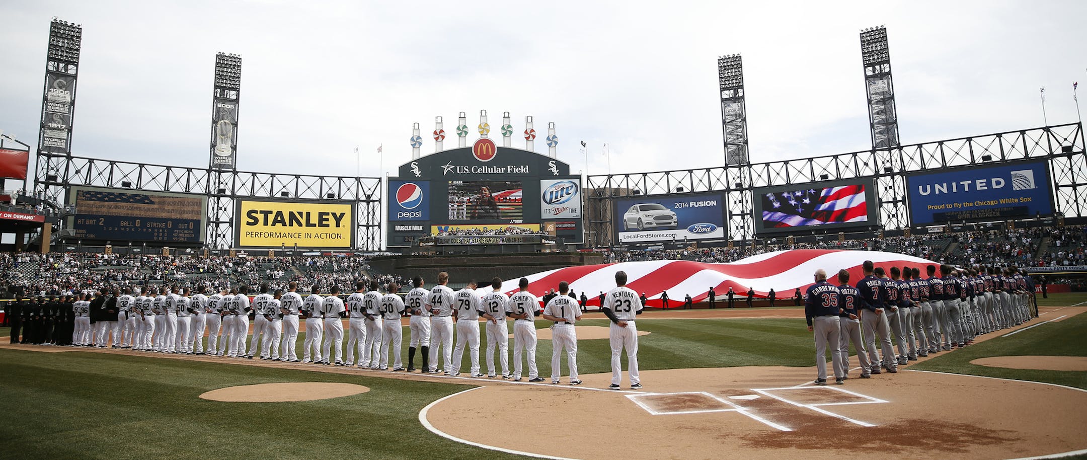 National Anthem before Chicago White Sox play Minnesota Twins on Opening Day at U.S. Cellular Field in Chicago on Monday, March 31, 2014. B583609004Z.1 (Scott Strazzante/Chicago Tribune) ....OUTSIDE TRIBUNE CO.- NO MAGS, NO SALES, NO INTERNET, NO TV, CHICAGO OUT, NO DIGITAL MANIPULATION... ORG XMIT: CHI1403311518402612