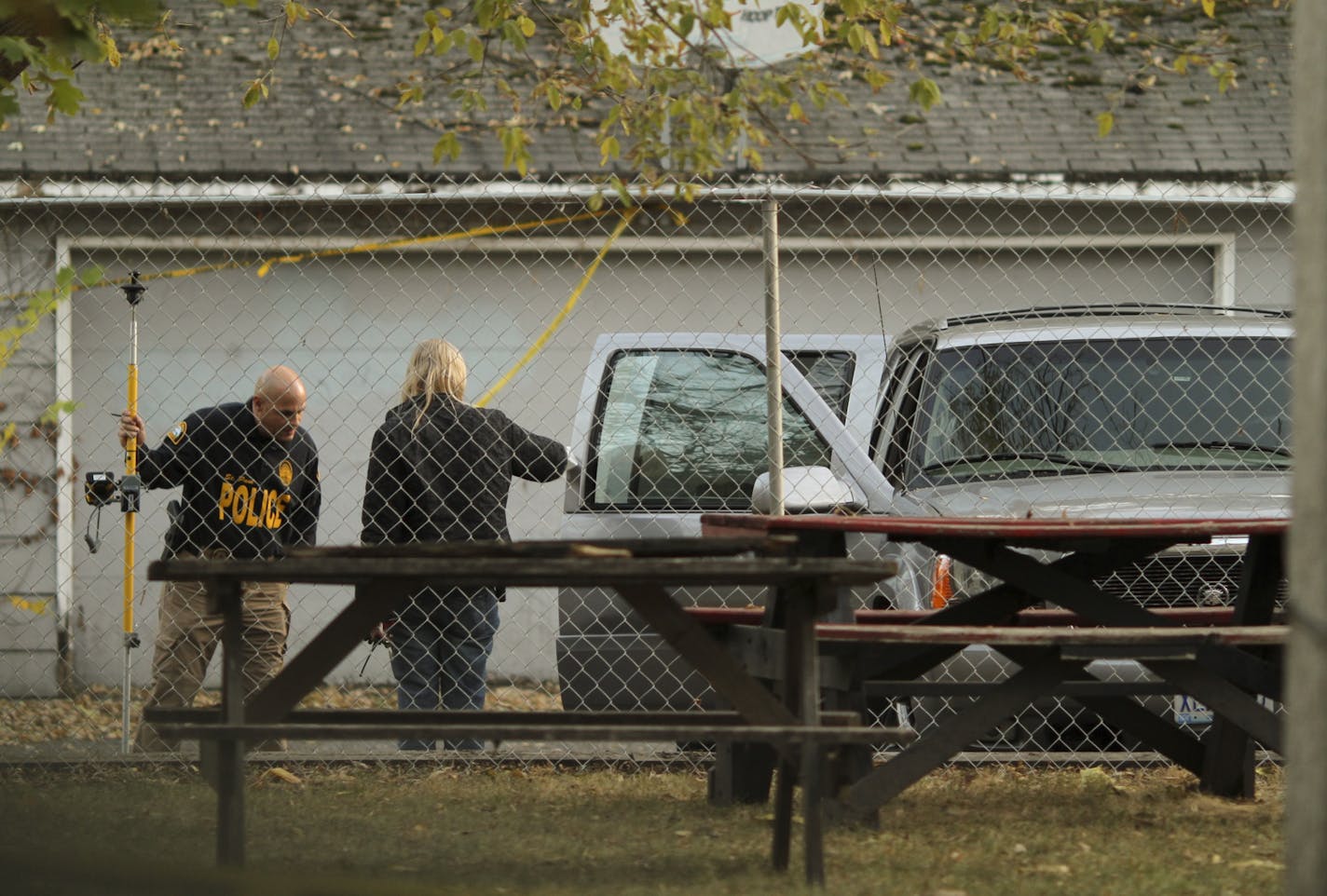 St. Paul Police investigators worked the scene in an alley on St. Paul's East Side Sunday afternoon where Naressa Turner, 20, was shot to death while in a parked car. Police don't believe the shooting was random.