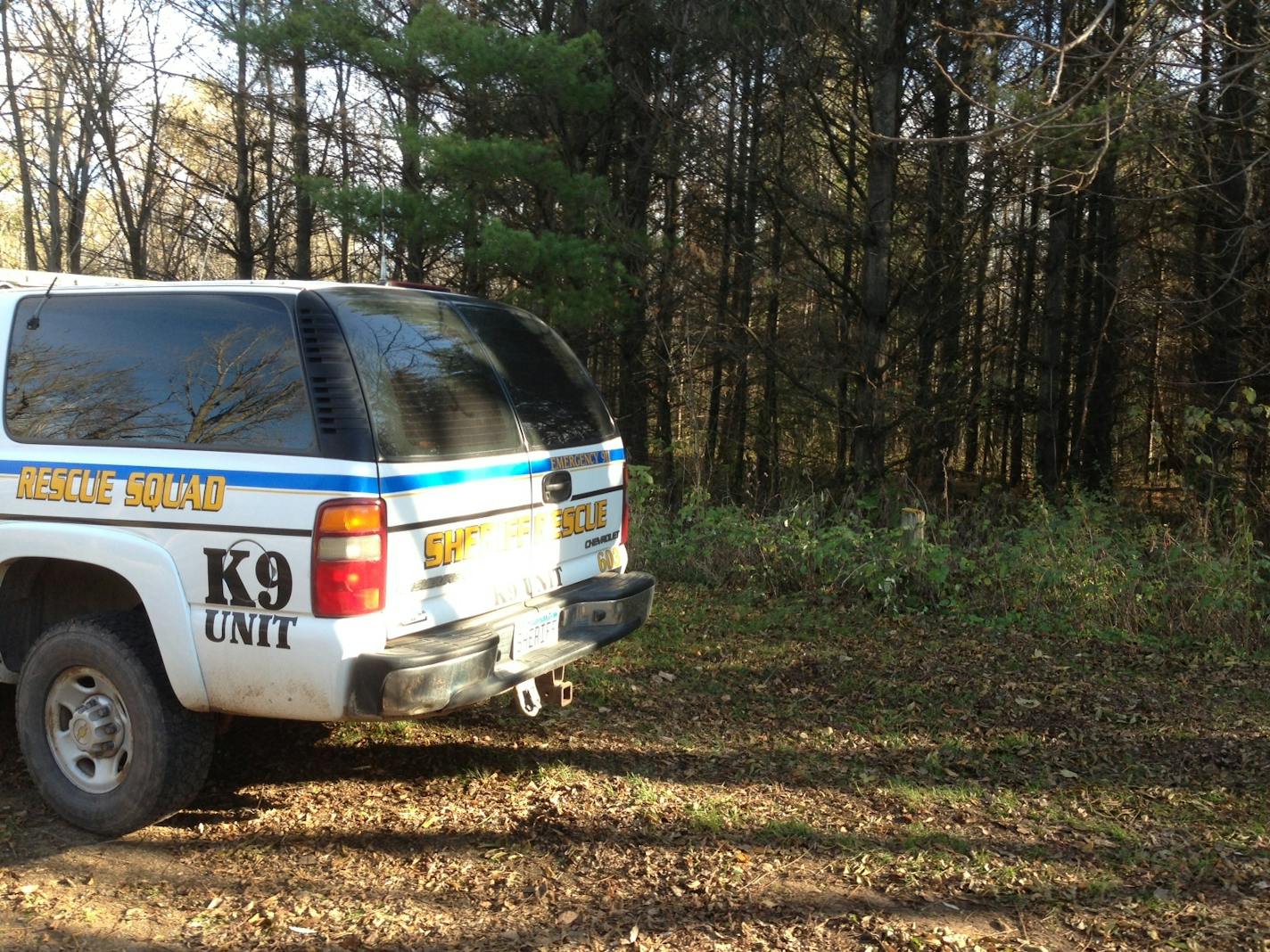 Authorities continued investigating the scene Oct. 27, 2013, where human remains were found near Sartell, Minn.