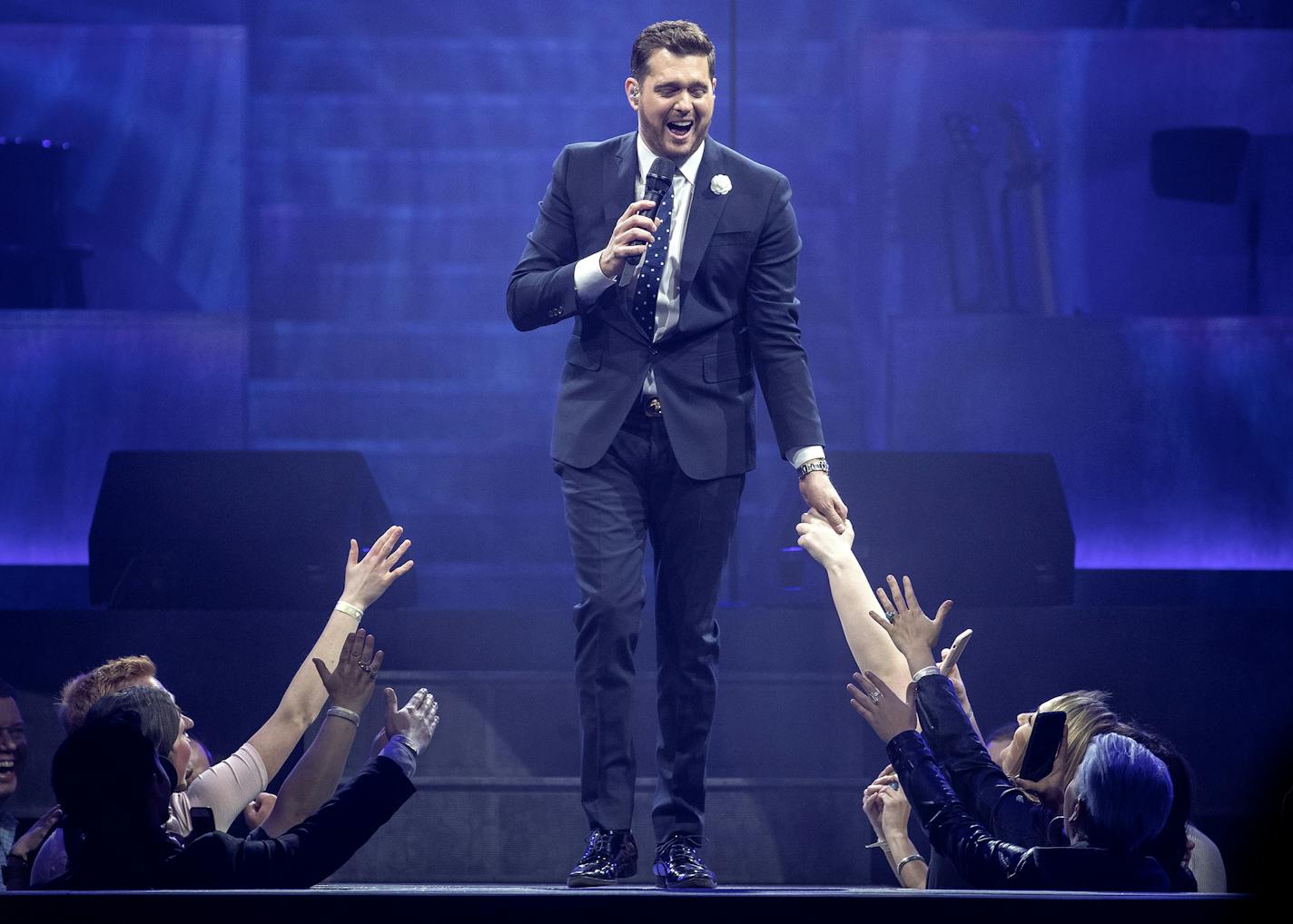 Michael Bublé was quick, witty and downright funny during his performance Monday at the Xcel Energy Center.