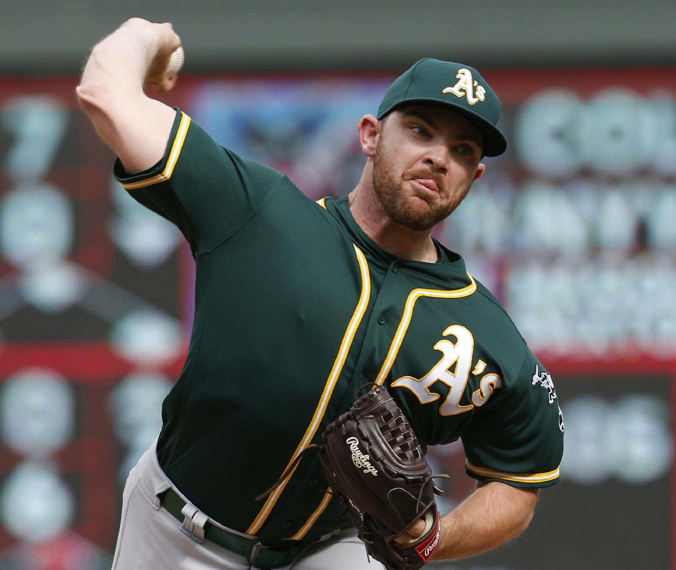 Oakland Athletics pitcher Liam Hendriks throws against the Minnesota Twins in the ninth inning of a baseball game Sunday, July 21, 2019, in Minneapolis. The Twins won 7-6. Hendriks picked up the loss. (AP Photo/Jim Mone)