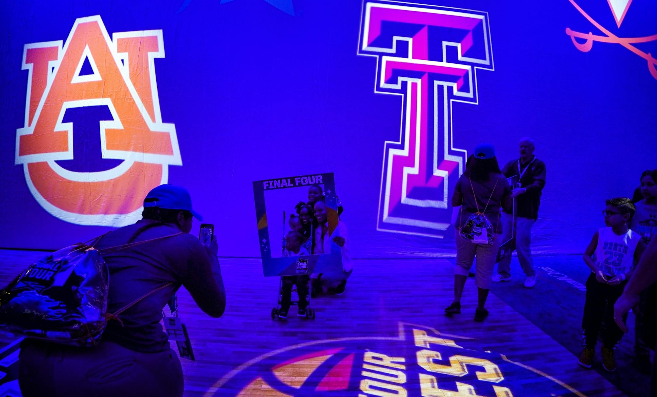 Fans were invited to frame themselves for a photo at the entrance to the Final Four Fan Fest at the Minneapolis Convention Center.