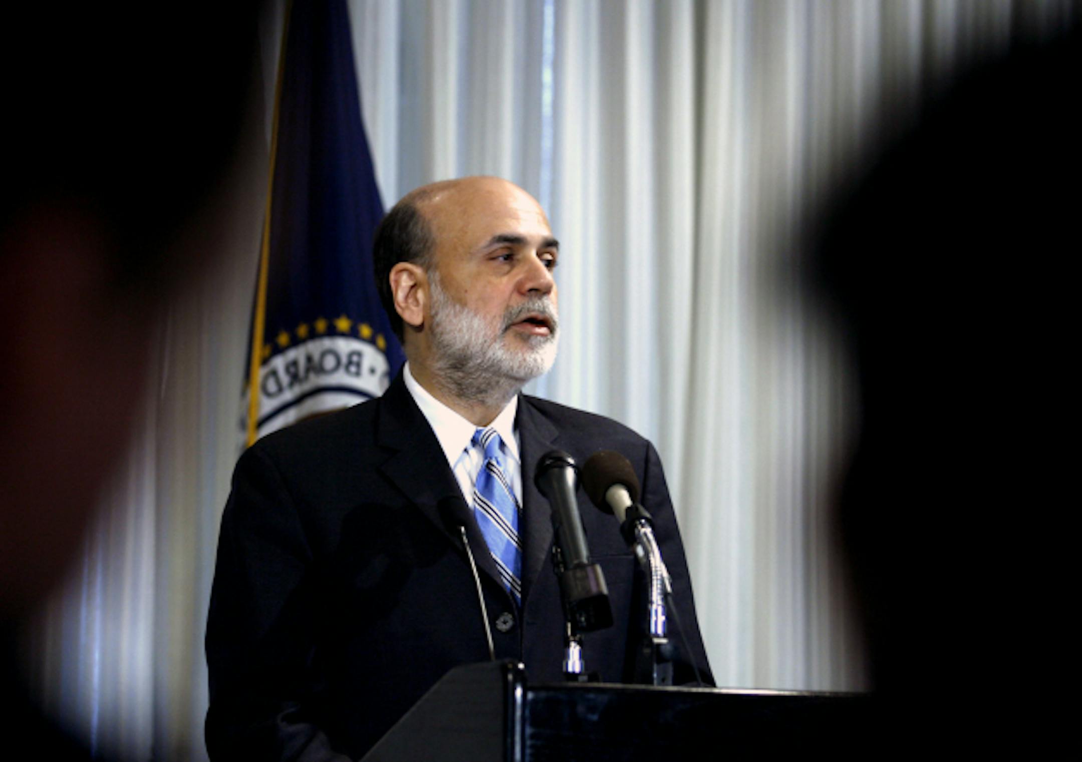 FILE - In this  Thursday, Dec. 4, 2008, file photo, Federal Reserve Chairman Ben Bernanke speaks on housing and housing finance, at the Federal Reserve in Washington .Federal Reserve officials agonized throughout 2008 over how far they could go to stop a financial catastrophe that threatened to pull the economy into a deep recession, transcripts of the Fed's policy meetings that year show.  (AP Photo/Jose Luis Magana, File)