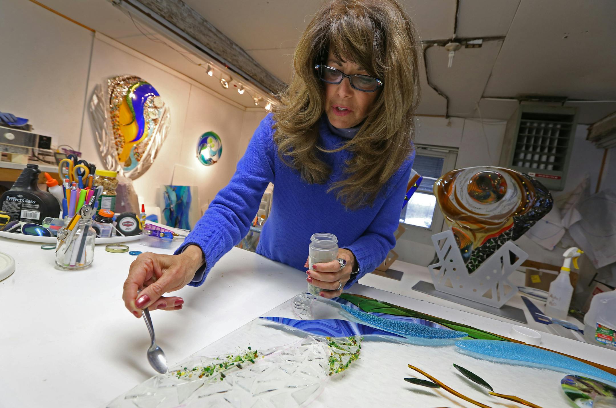 Bonnie Rubenstein makes kiln-formed fused-glass artwork. She makes sculptures and light fixtures, but she is best known for her themed murals, which are on display in a number of hospitals, including Children's Hospitals in both Minneapolis and St. Paul. Rubenstein workes out of her studio which is in a barn in River Falls Wisconsin.] Bruce Bisping/Star Tribune bbisping@startribune.com Bonnie Rubenstein/source.