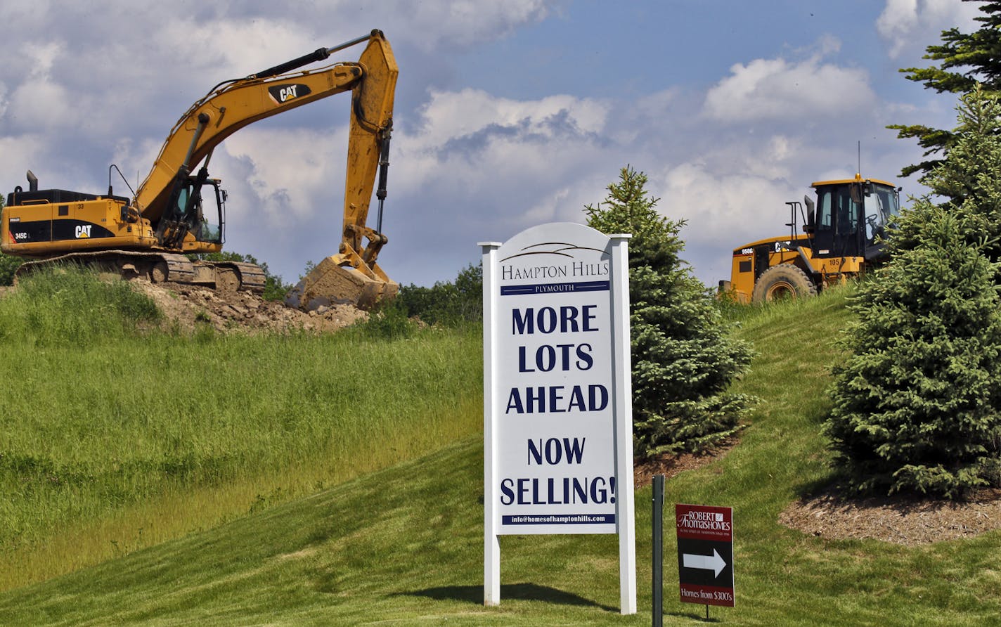 Developers are turning Hampton Hills Golf Course in Plymouth into a housing subdivision with construction equipment and houses sitting atop former fairways and tee boxes. (MARLIN LEVISON/STARTRIBUNE(mlevison@startribune.com (cq )