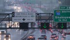 Heavy rain soaked the metro area Monday morning, messing with the commute and bringing with it high winds. Here, traffic was at a stand still on I-35W
