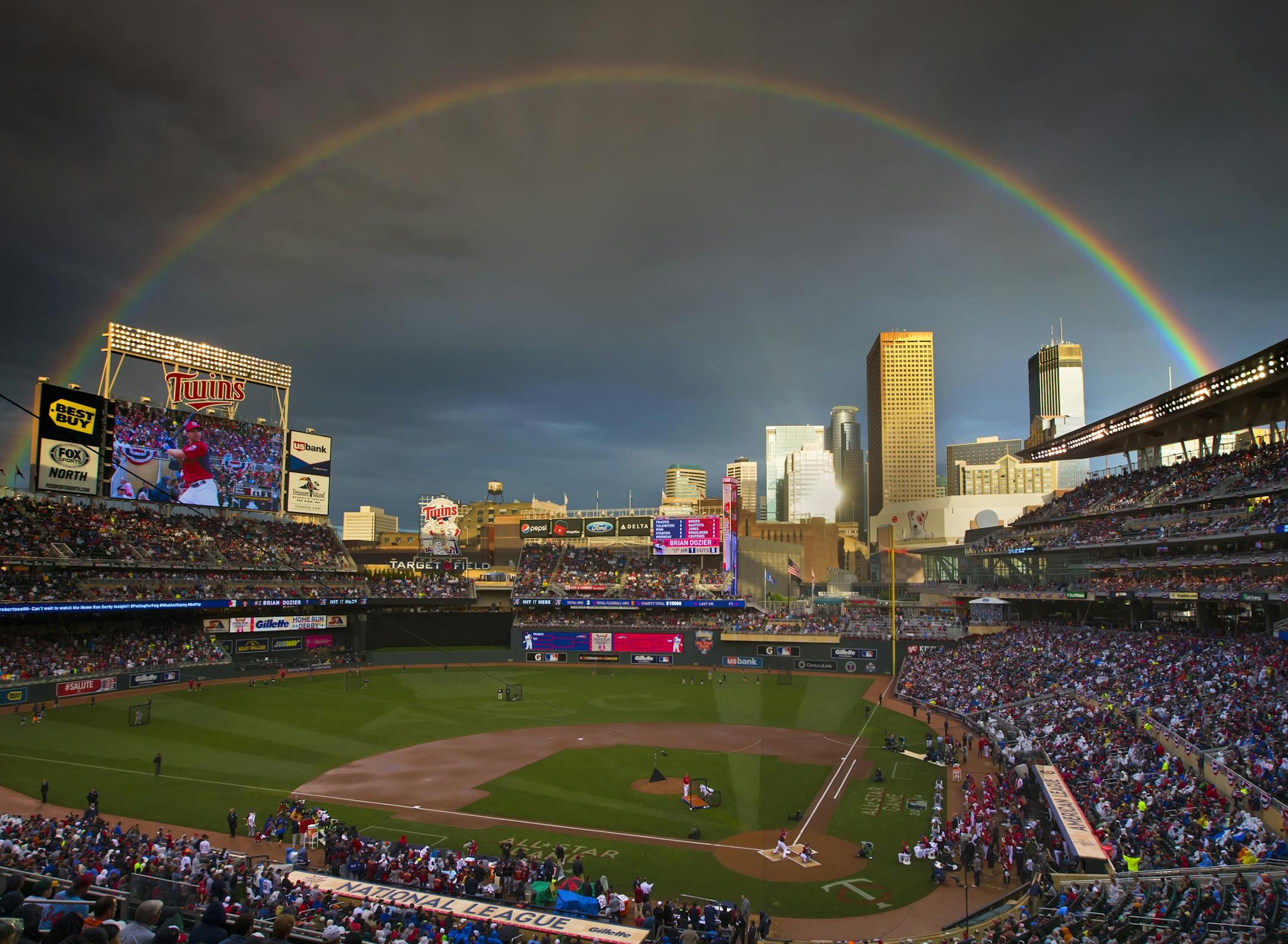 Those that waited out the rain delay were treated to a beautiful rainbow as Twins Brian Dozier took the plate in the Home Run Derby at Target Field. ] 2014 MLB All Star Game, Target Field BRIAN PETERSON ‚Ä¢ brian.peterson@startribune.com Minneapolis, MN 07/14/2014