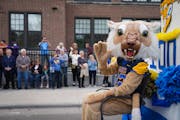 Tommie, the Edison High School mascot, rode on a float in front of the school during the homecoming parade Friday, Sept. 30, in northeast Minneapolis.