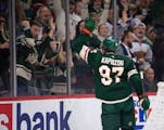 Minnesota Wild left wing Kirill Kaprizov (97) waved to fans on the glass after he scored in the second period of the game Thursday, Dec. 1, 2022 at Xc
