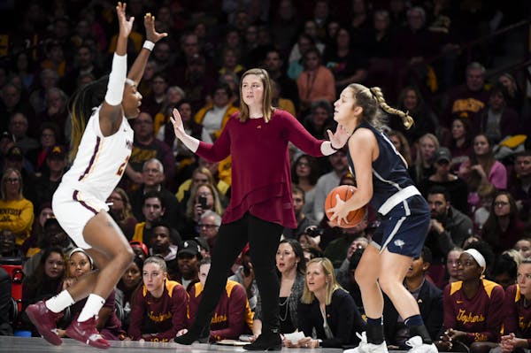 Gophers head coach Lindsay Whalen watched as guard Jasmine Brunson defended against New Hampshire guard Sarah Clement in November.