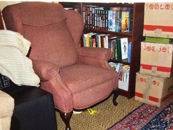 Chair where Byron Smith sat in his basement. Evidence photo.