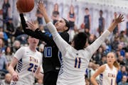 Lanelle Wright (10) and Minnetonka defeated Lake Conference rival Hopkins 64-61 last week, helping the Skippers reclaim the top spot in the season's f