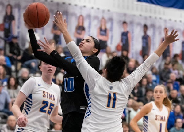 Lanelle Wright (10) and Minnetonka defeated Lake Conference rival Hopkins 64-61 last week, helping the Skippers reclaim the top spot in the season's f