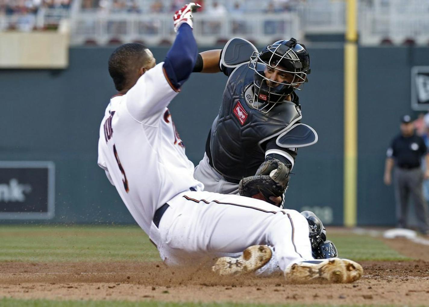 Chicago White Sox catcher Geovany Soto tags out Minnesota Twins� Eduardo Nunez, left, as he attempted to score on an RBI single by Kurt Suzuki in the fourth inning of a baseball game, Tuesday, June 23, 2015, in Minneapolis.