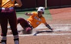 The Gophers' Katelyn Kemmetmueller stole home in the third inning in an 8-1 victory over Georgia in the NCAA Minneapolis regional final Monday.
