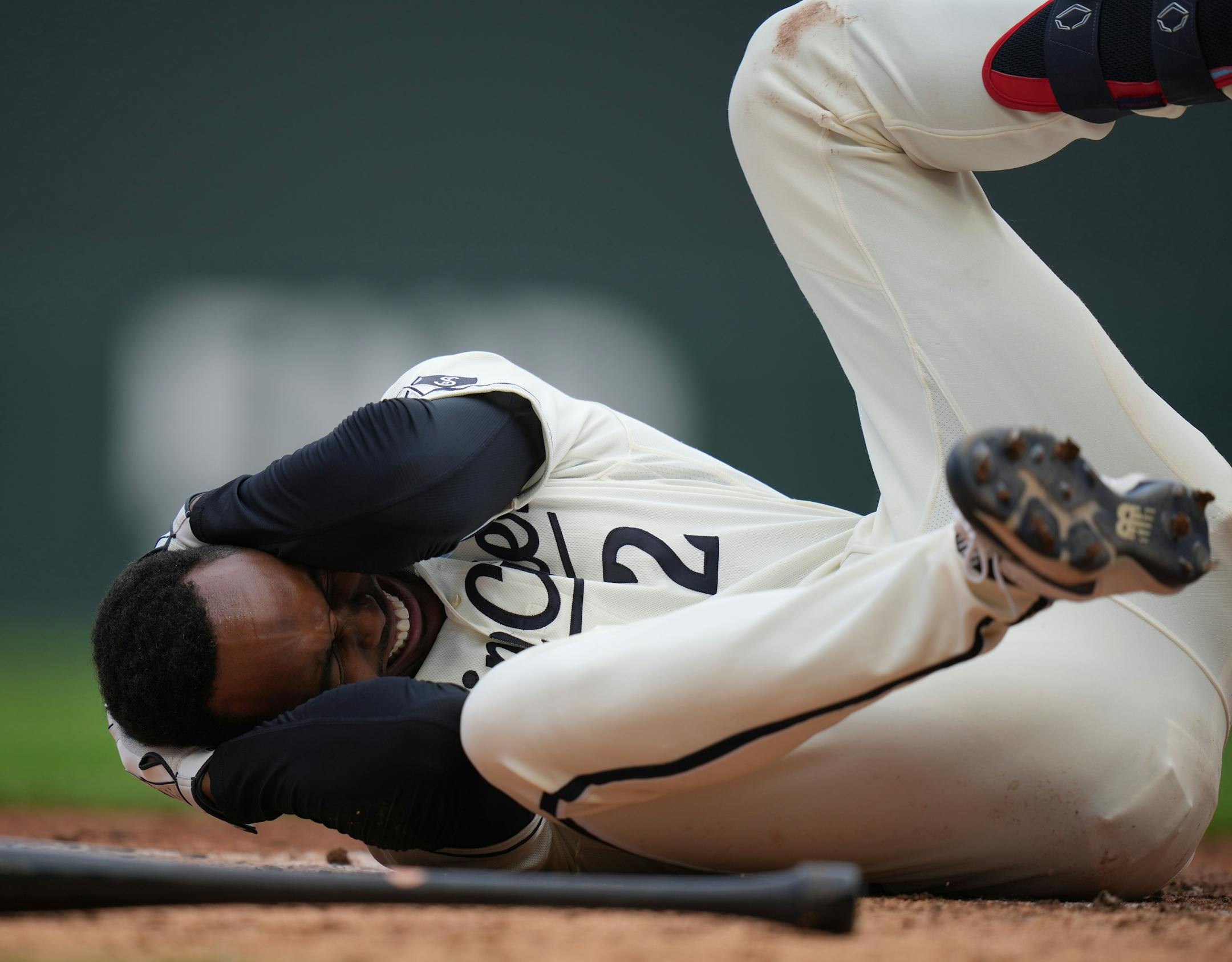 Minnesota Twins center fielder Michael A. Taylor (2) is hit in the head in the 8th inning.