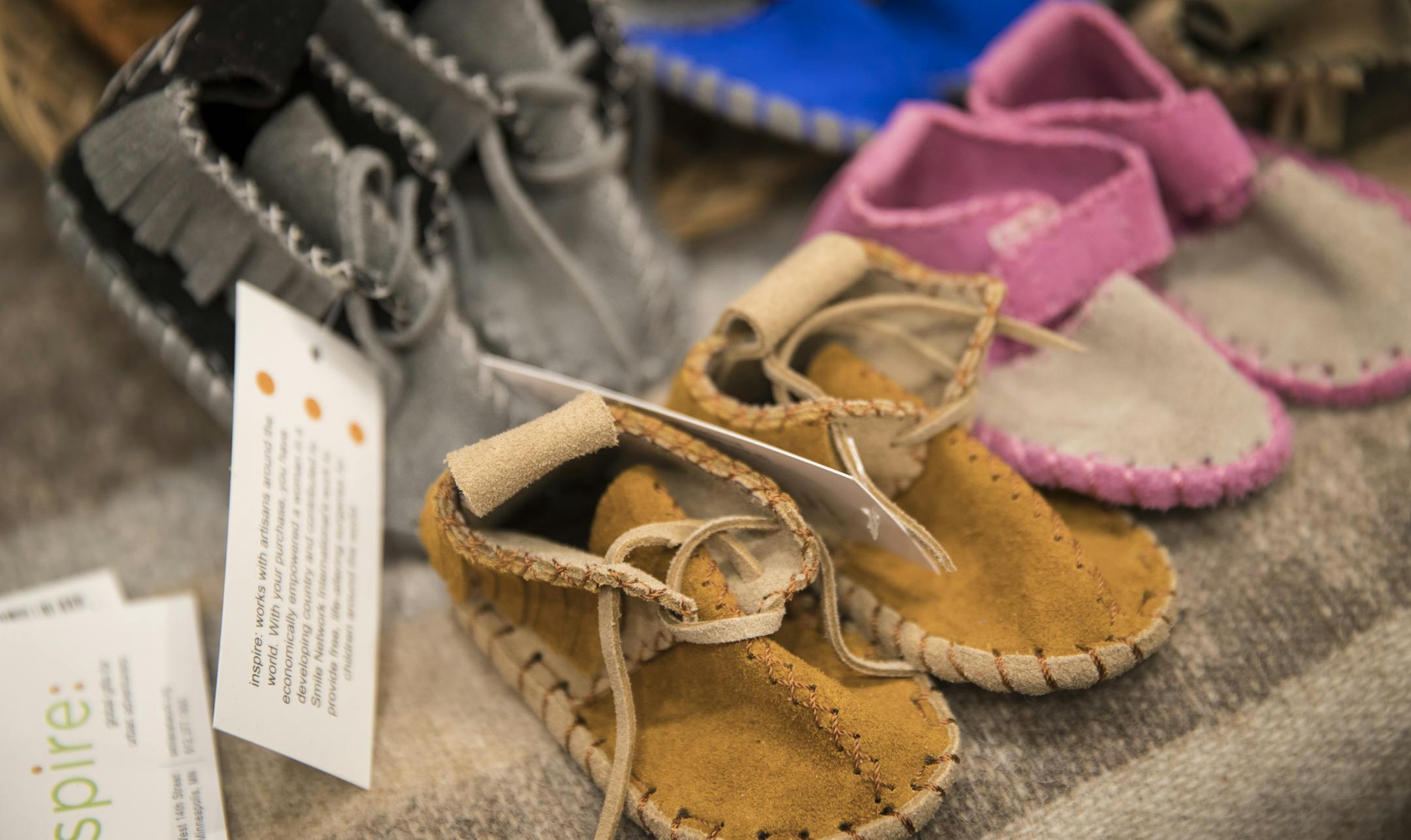 Accesories on display at the Mall of America store Debut Shop for Kindness at the Mall of America in Bloomington, Minn., on Friday, May 12, 2017. inspire: smile :) is described as "providing free cleft surgeries for impoverished children through the sale of boutique apparel and accessories." ] RENEE JONES SCHNEIDER • renee.jones@startribune.com