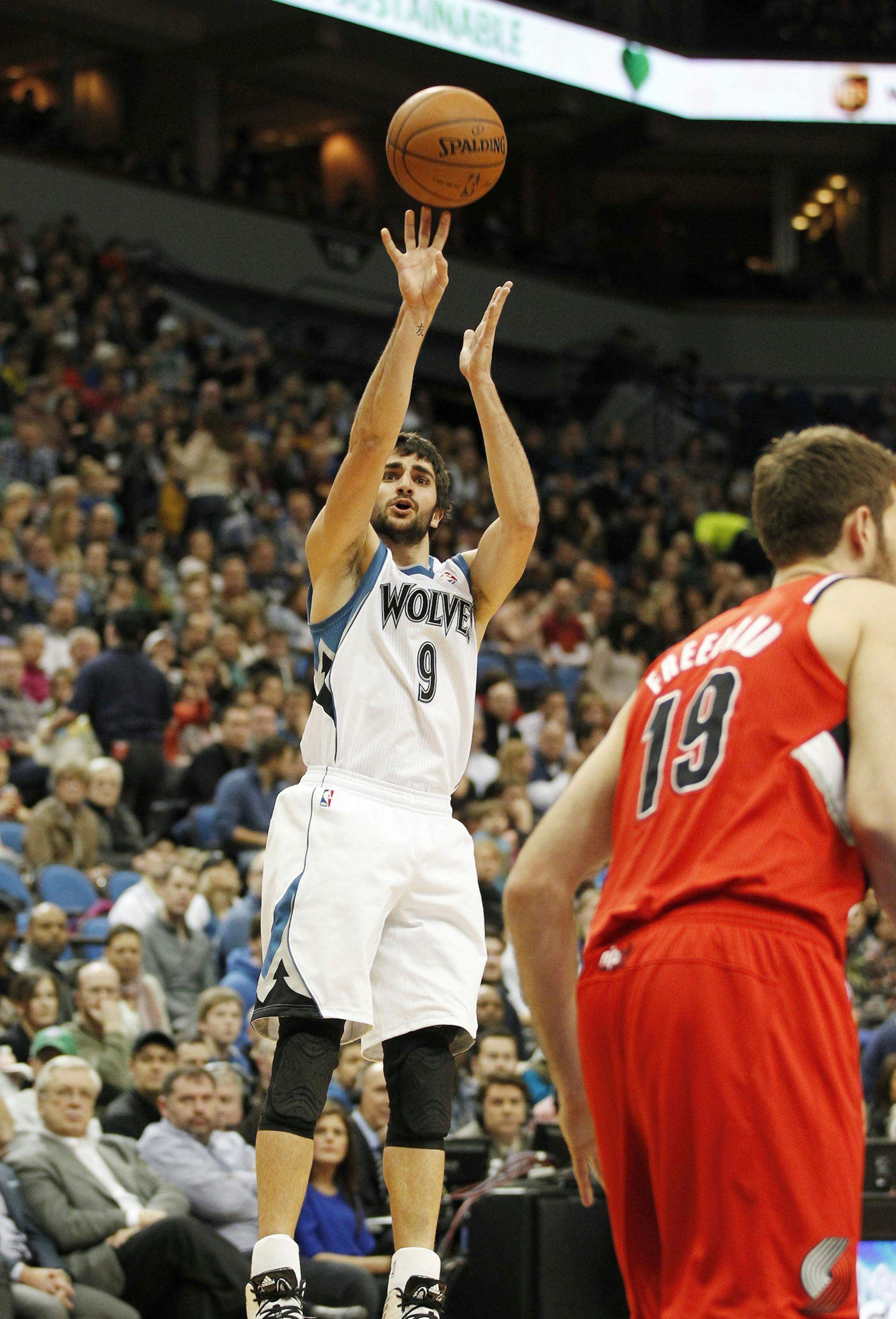 Minnesota Timberwolves guard Ricky Rubio shoots against the Portland Trail Blazers in the first quarter of their NBA basketball game won by the Trail Blazers 117-110 on Saturday, Feb. 8, 2014 in Minneapolis.(AP Photo/Andy Clayton-King)