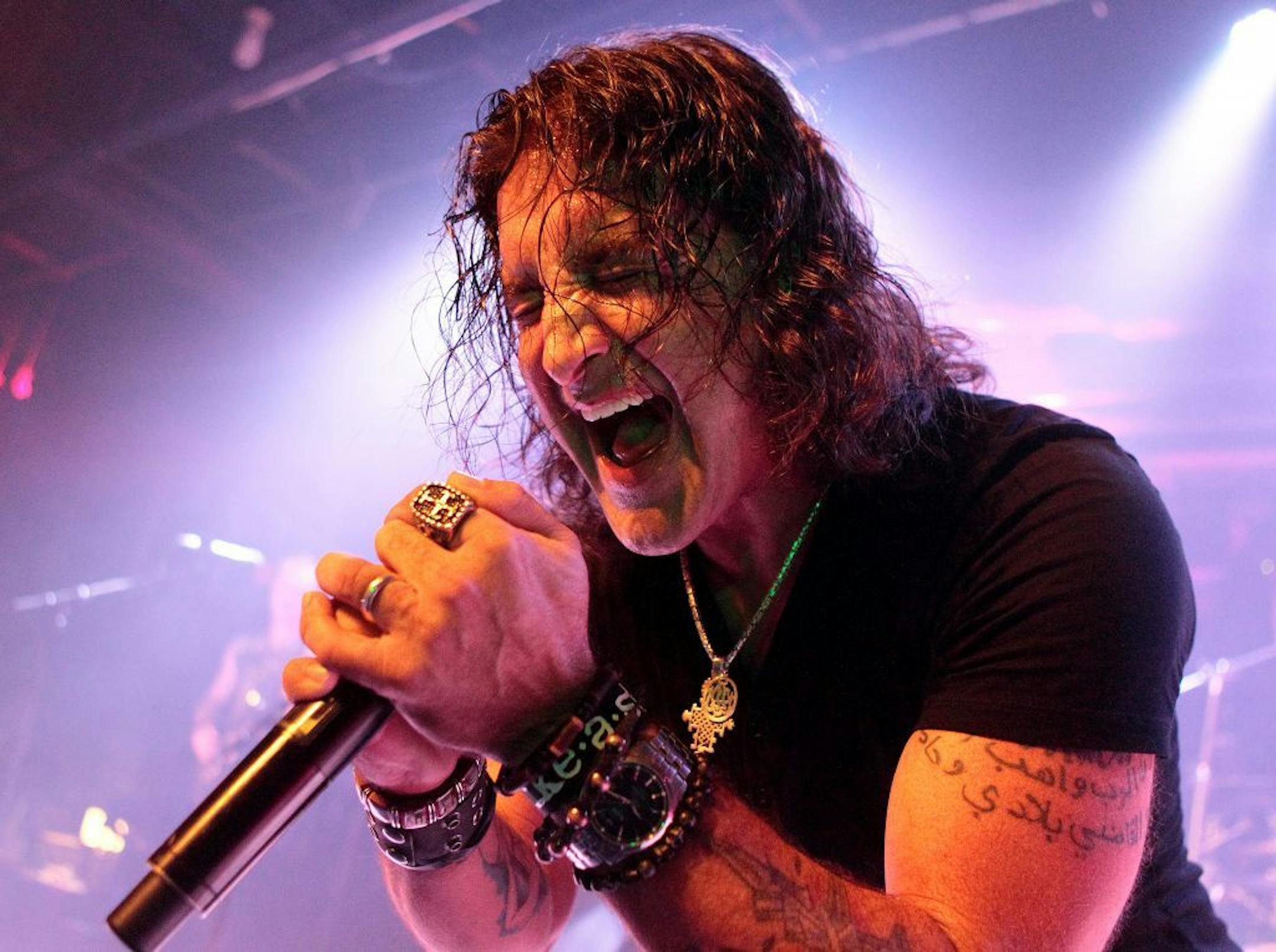 FILE - In this Sunday, April 6, 2014, file photo, singer Scott Stapp, of the band Creed, performs solo in concert at Soundstage, in Baltimore. Creed frontman Stapp�s wife is seeking a divorce from her estranged husband. Jaclyn Stapp filed for divorce from the 41-year-old singer and asked a judge in Palm Beach County, Florida, in Nov. 2014 to have her husband admitted to a substance abuse facility.