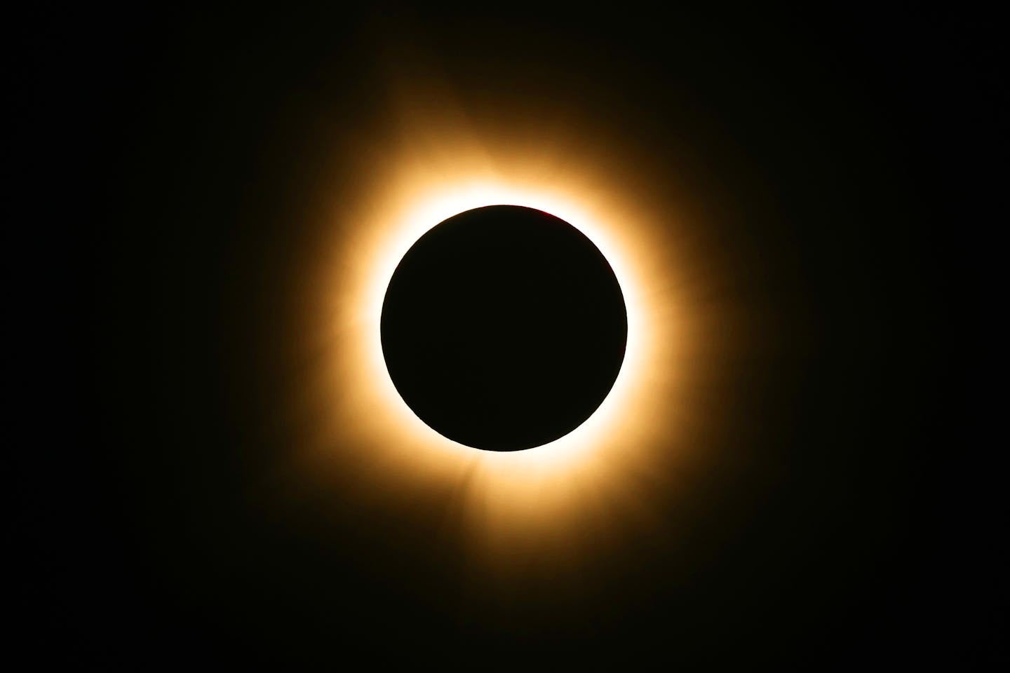 The moon passes in front of the sun for a total solar eclipse April 8, visible from Farmington, Mo.
