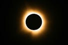 The moon passes in front of the sun for a total solar eclipse April 8, visible from Farmington, Mo.
