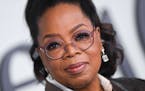 Oprah Winfrey arrives for the premiere of "The 1619 Project" at the Academy Museum of Motion Pictures in Los Angeles on Jan. 26, 2023. (Valerie Macon/