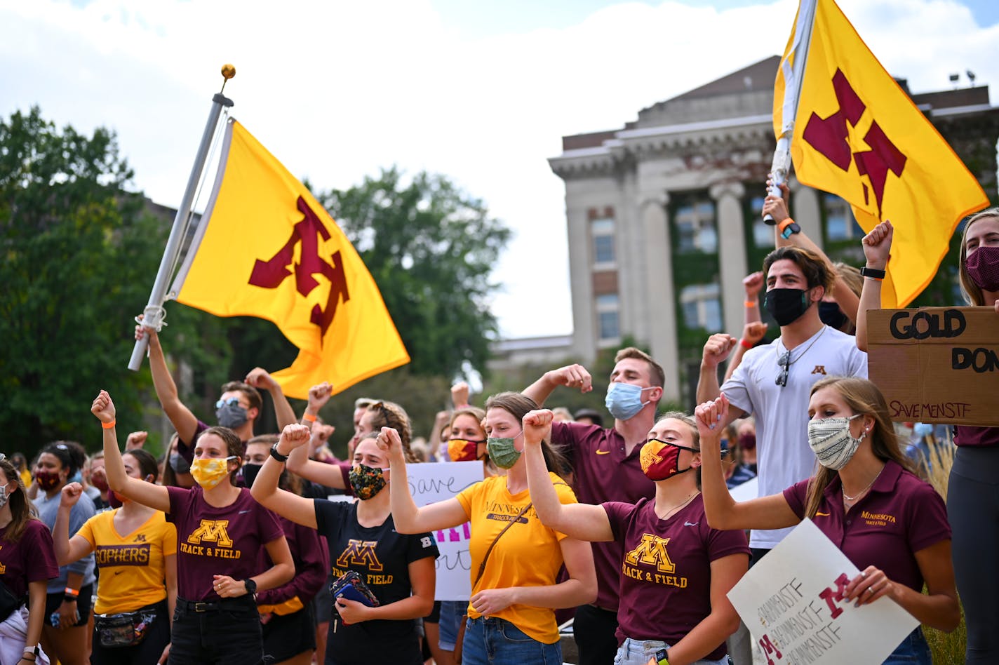 Gophers student athletes sang the Minnesota Rouser after concluding a march and protest against plans by the university to cut some men's sports