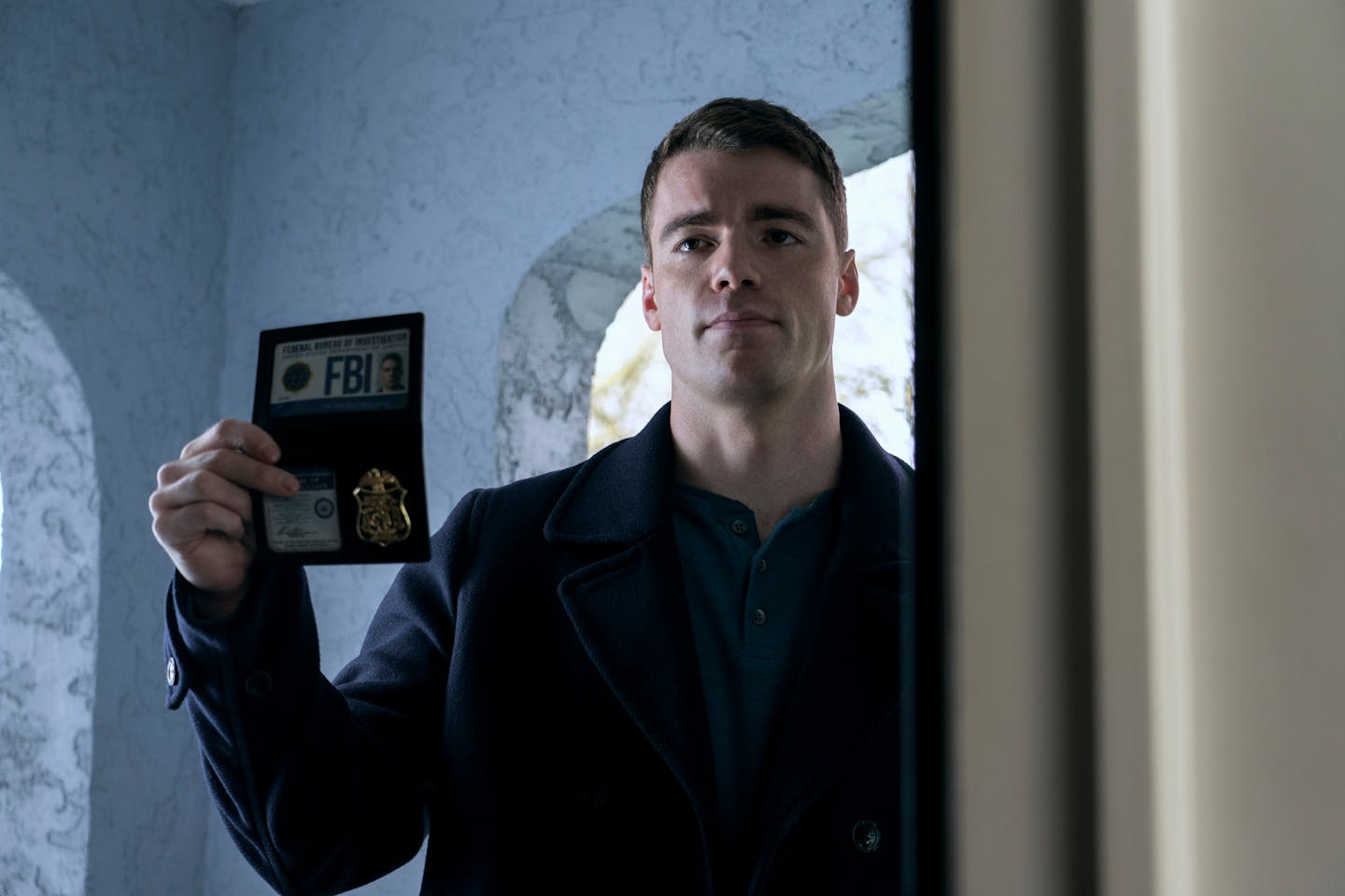 In "The Night Agent," Gabriel Basso plays a low-level FBI agent assigned to monitor the phones on the graveyard shift.