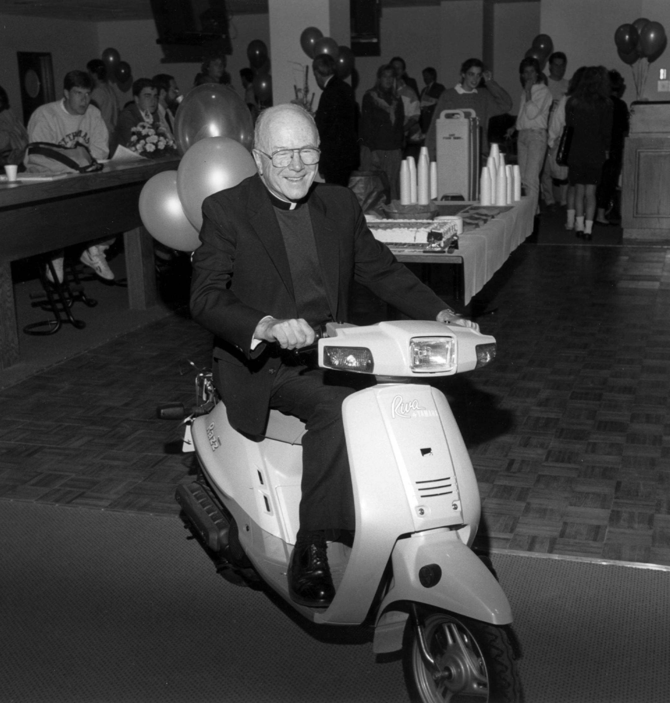 The Rev. Thomas Lavin counseled generations of Tommies, but he wasn't just about prayer and education. Nicknamed "Scooter," he also loved fun, like motoring inside his namesake dining hall.
