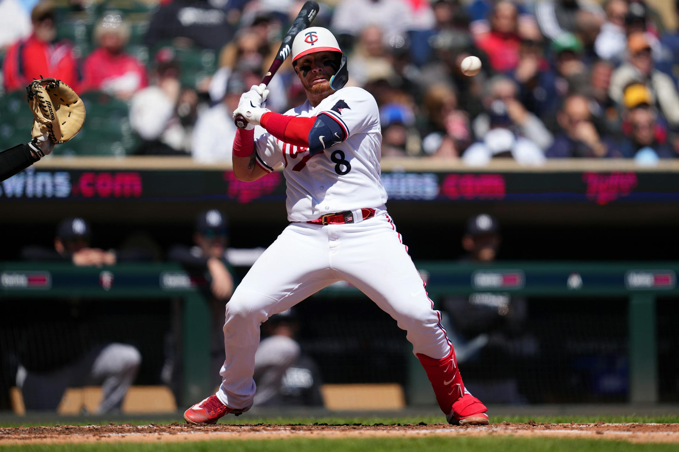 Minnesota Twins catcher Christian Vazquez (8) dodges an inside pitch in the second inning.